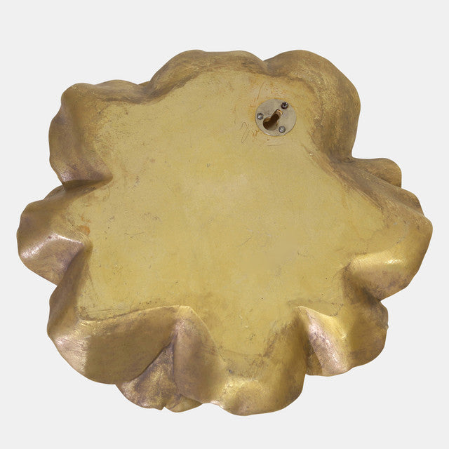 Flor de pared dorada