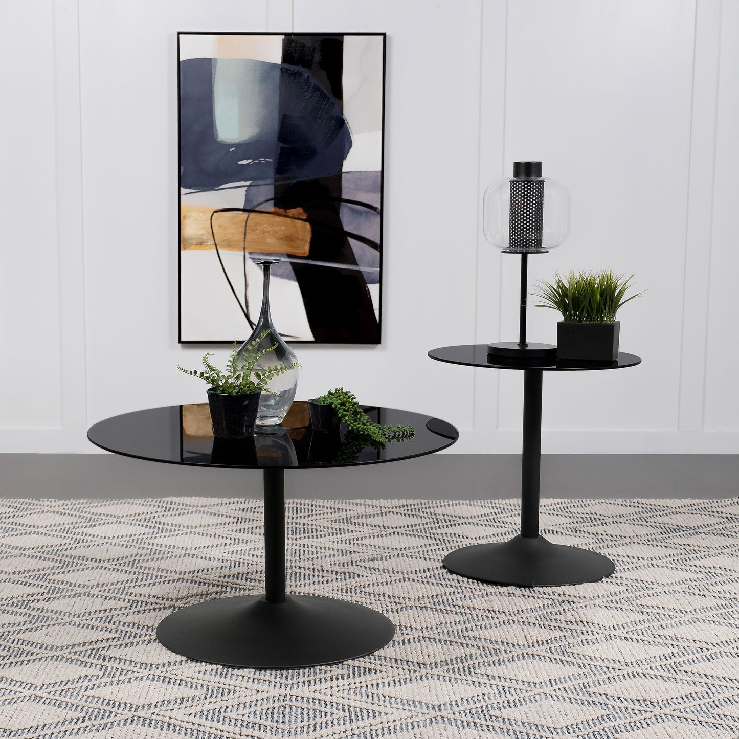 Mesa de centro redonda de metal Ganso con tablero de vidrio templado negro