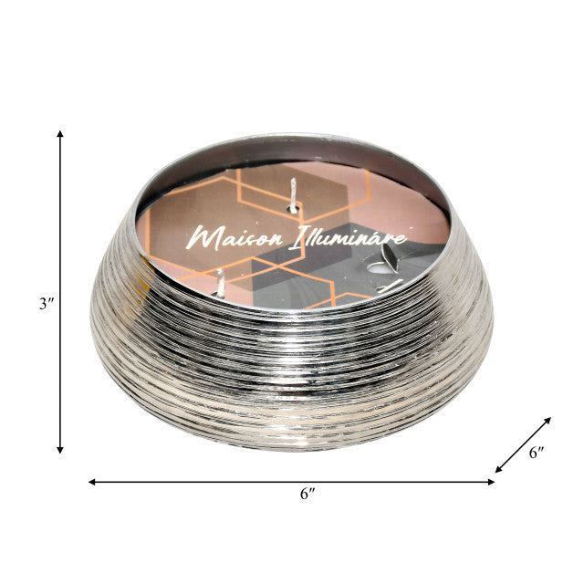 Vela de metal grabada con pera especiada