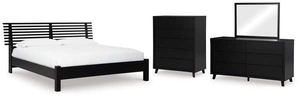 Danziar Queen Slat Panel Bed, Dresser, Mirror and Chest