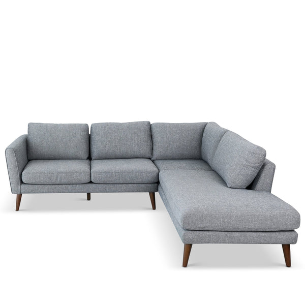 Sofá seccional Benson de tela gris con chaise longue orientada a la derecha