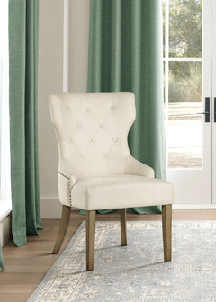 Silla de comedor Baney tapizada en tela beige y negra