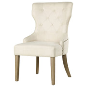 Silla de comedor Baney tapizada en tela beige y negra