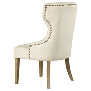 Silla de comedor Baney tapizada en tela beige y negra