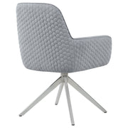 Silla de comedor giratoria Abby tapizada en tela gris claro