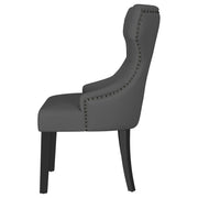 Silla de comedor Baney tapizada en tela beige y negra