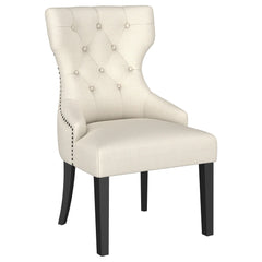 Silla de comedor Baney tapizada en tela beige y negra