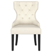 Silla de comedor Baney tapizada en tela beige y negra