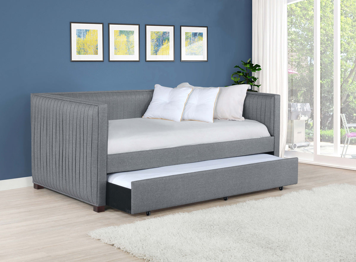 Sofá cama tapizado Brodie con cama nido gris