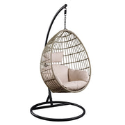 Silla colgante Vasant de 94 cm de ancho y forma envolvente