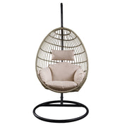 Silla colgante Vasant de 94 cm de ancho y forma envolvente