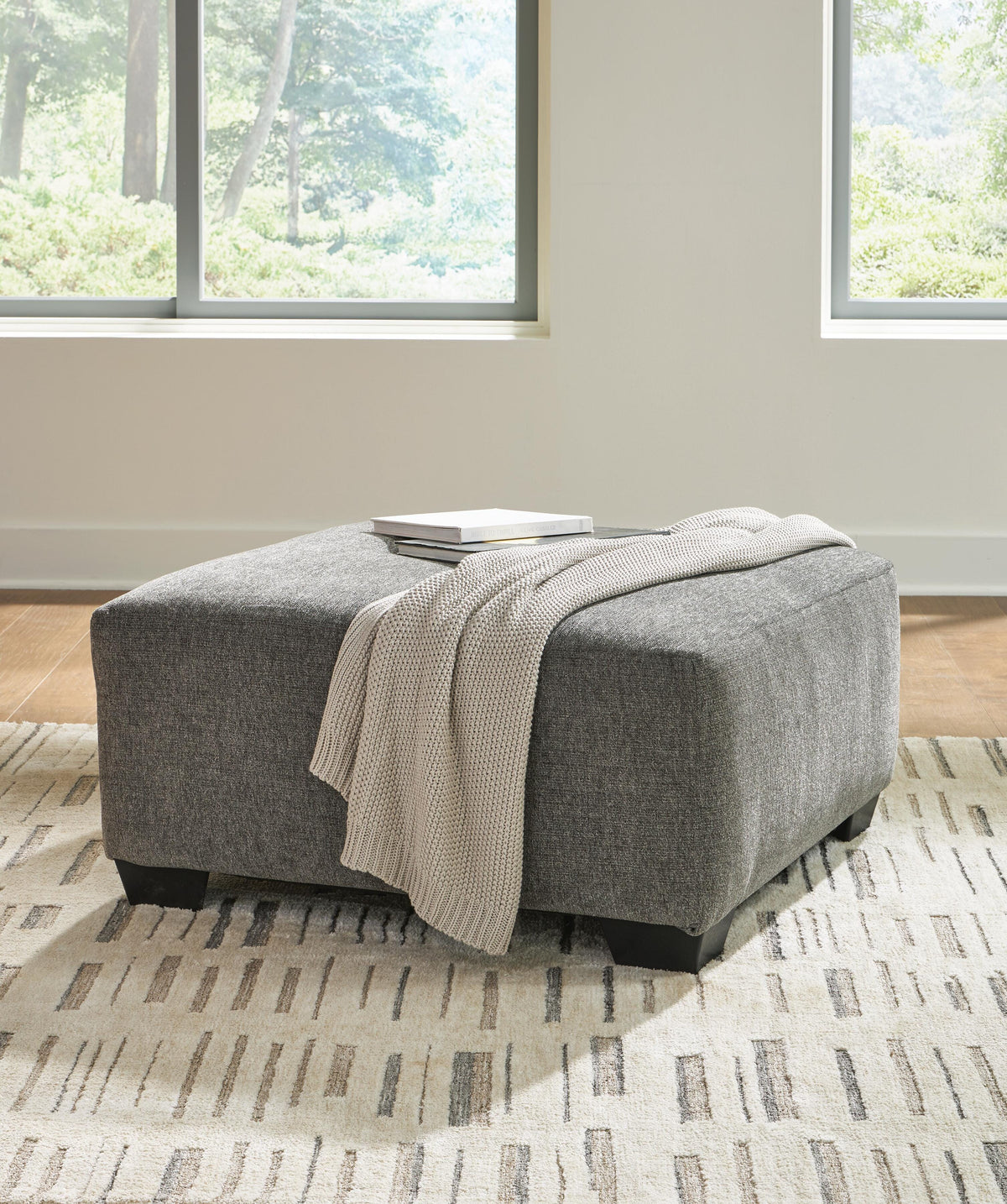 Newellen 3-Piece Sectional and Oversized Ottoman