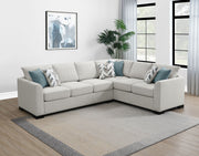 Sofá cama seccional tapizado en chenilla Ashford en color grisáceo