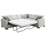 Sofá cama seccional tapizado en chenilla Ashford en color grisáceo