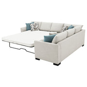 Sofá cama seccional tapizado en chenilla Ashford en color grisáceo