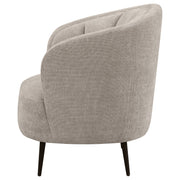 Silla Ellorie con respaldo curvo y tapizado en beige