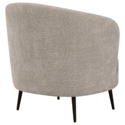 Silla Ellorie con respaldo curvo y tapizado en beige