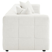 Sofá extra largo tapizado Everly Boucle en color blanco roto
