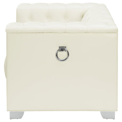 Sillón Chaviano tapizado con brazos articulados, color blanco perla