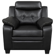 Sillón tapizado Finley con brazos acolchados y capitoné, color negro