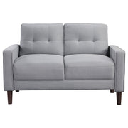 Conjunto de sofá capitoné Bowen con brazos articulados tapizados en beige