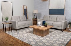 Conjunto de sofá capitoné Bowen con brazos articulados tapizados en beige