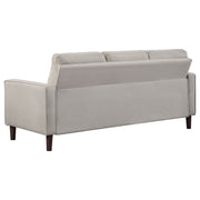 Conjunto de sofá capitoné Bowen con brazos articulados tapizados en beige