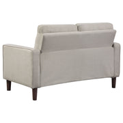 Conjunto de sofá capitoné Bowen con brazos articulados tapizados en beige