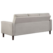 Conjunto de sofá capitoné Bowen con brazos articulados tapizados en beige