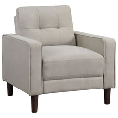 Sillón tapizado Bowen con brazos de riel y capitoné, color gris