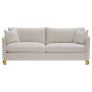 Sofá Corliss tapizado con brazos curvos en beige