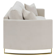 Sofá Corliss tapizado con brazos curvos en beige