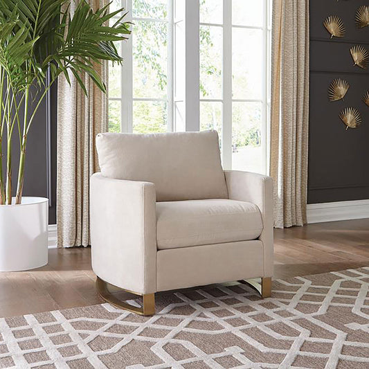 Sillón Corliss tapizado con brazos curvos en beige