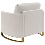 Sillón Corliss tapizado con brazos curvos en beige