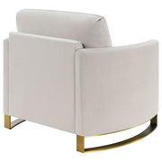 Sillón Corliss tapizado con brazos curvos en beige