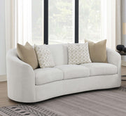 Sofá Rainn Boucle tapizado con brazos inclinados color Latte