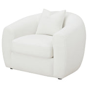 Sillón tapizado de piel de oveja sintética Isabella, color natural