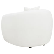 Sillón tapizado de piel de oveja sintética Isabella, color natural