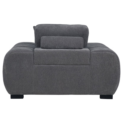 Sillón tapizado con brazos articulados Octavia