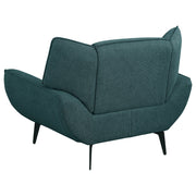 Sillón Acton tapizado con brazos acampanados, color azul verdoso