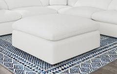 Otomana tapizada Raleigh Boucle gris