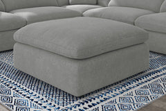 Otomana tapizada Raleigh Boucle gris