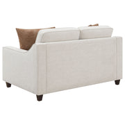 Loveseat tapizado con brazos inclinados Christine en beige