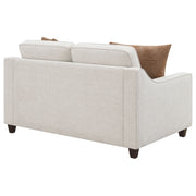 Loveseat tapizado con brazos inclinados Christine en beige
