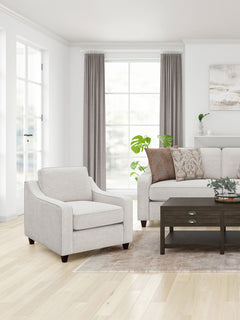 Sillón tapizado con brazos inclinados Christine en beige