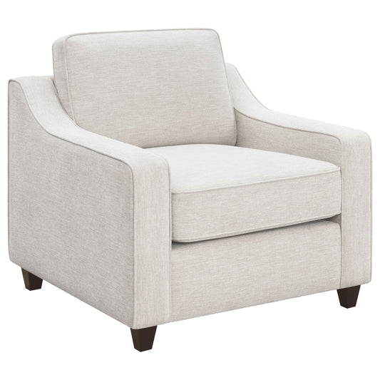 Sillón tapizado con brazos inclinados Christine en beige