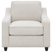 Sillón tapizado con brazos inclinados Christine en beige