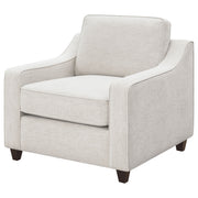 Sillón tapizado con brazos inclinados Christine en beige