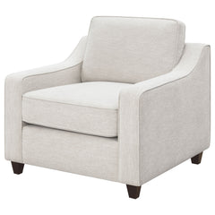 Sillón tapizado con brazos inclinados Christine en beige