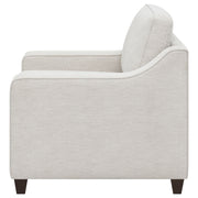 Sillón tapizado con brazos inclinados Christine en beige